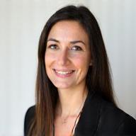 Professional headshot of Dr. Elena Petrova, Founder & Lead Consultant.